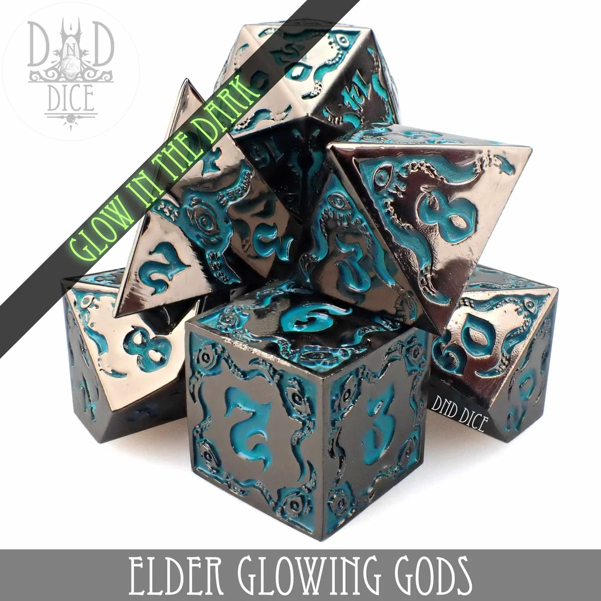 Elder Glowing Gods metal dice set with gothic filigree and teal enamel inlay that glows under blacklight