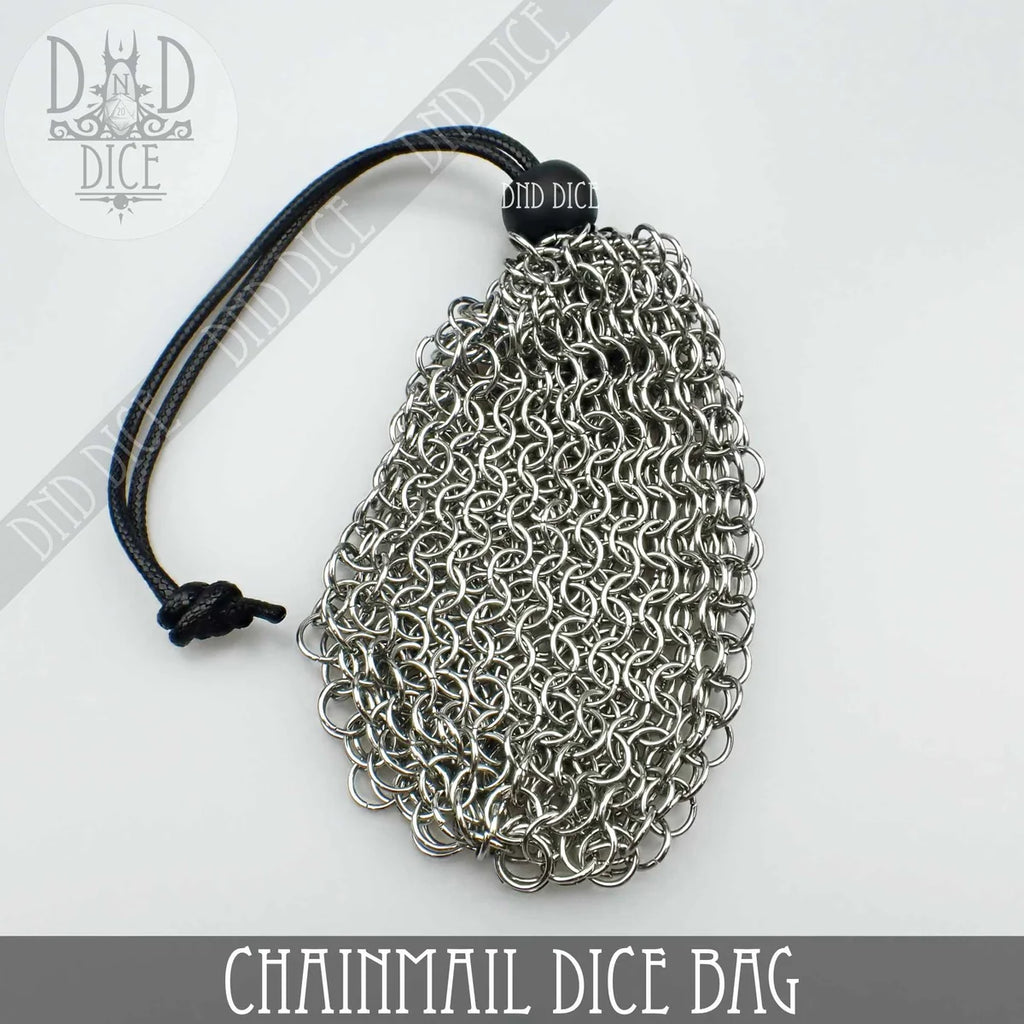 Stainless steel chainmail RPG dice bag with drawstring, holding a set of polyhedral dice