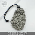 Stainless steel chainmail RPG dice bag with drawstring, holding a set of polyhedral dice